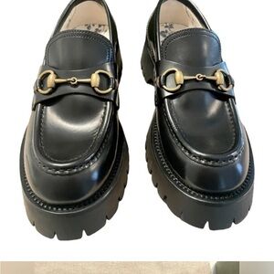 Gucci Black Leather Loafers with Gold Hardware